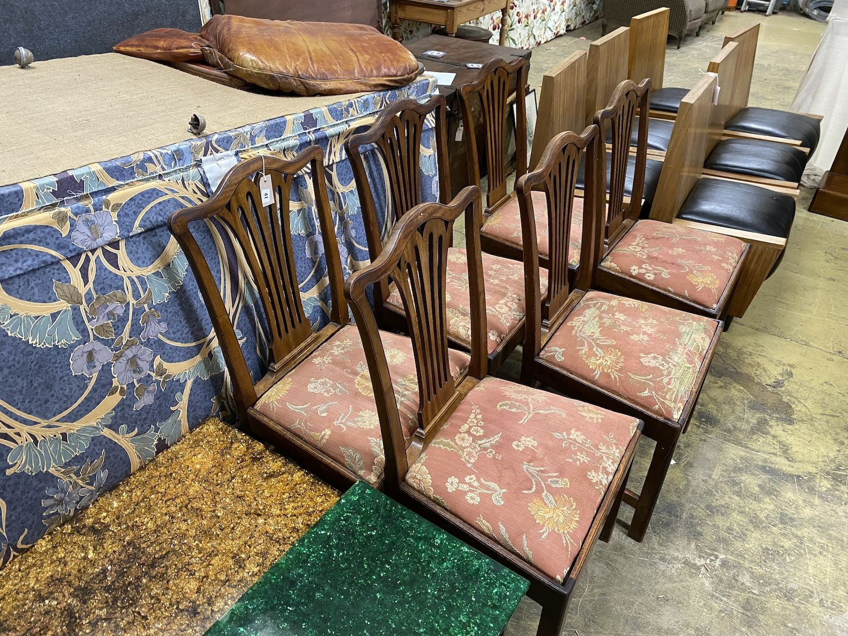 A set of six George III provincial mahogany dining chairs